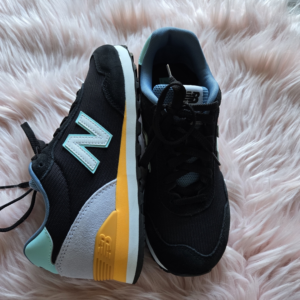 New Balance Black Sneakers with Yellow and Blue Highlights